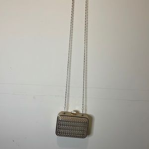 Small clutch purse gold.